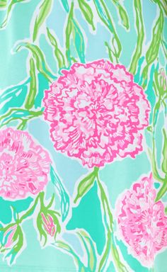 pink flowers on blue background with green leaves