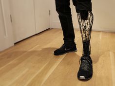 a person standing on top of a hard wood floor