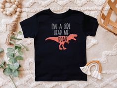 I'M A GIRL, HEAR ME ROAR. GIRL DINOSAUR SHIRT. Super cute & fun GIRLS toddler t-shirt! Available in size 6 month - 5/6. I use high quality t-shirts & they are amazingly SOFT! They run pretty true to size, but you can always size up so your little one can grow into it! If you would like a different color vinyl or any personalization, please message me prior to ordering and I would be happy to customize it for you! Every shirt is designed, die cut & pressed by me. please allow 2-5 busi Toddler Girl Tees, Funny Toddler Shirt, Girl Power Shirt, Toddler Girl Gifts, Girl Dinosaur, Toddler Humor, Dinosaur Shirt, Toddler Fall, Kids Graphic Tees