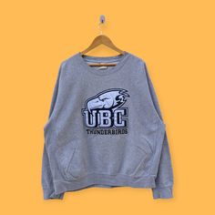 vintage UBC thunderbirds embroidered logo sweatshirt UBC thunderbirds crewneck sweater pullover college style nice gray colour size x-large by YoungmodernCo on Etsy Crew Neck Sweater, Bathing Beauties, Sweatshirts Hoodie