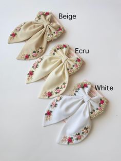 three different types of hair bows on a white surface with words describing the names of them