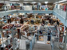 an overhead view of the inside of a building with lots of shelves and boxes in it