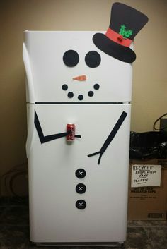 a refrigerator decorated like a snowman with a top hat