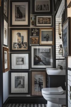 a white toilet sitting in a bathroom next to a black and white checkered floor