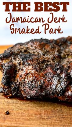 the best jamaican jerk smoked pork on a cutting board with text overlay that reads, the best jamaican steak smoked pork