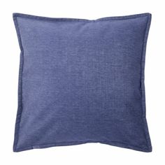 a blue pillow on a white background