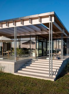 an outdoor patio with steps leading up to it