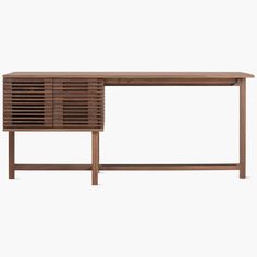 the sideboard is made out of wood and has shutters on each side,