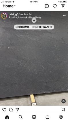 a black granite counter top with an instagramtion sticker on the bottom that reads, nocturnal honed granite