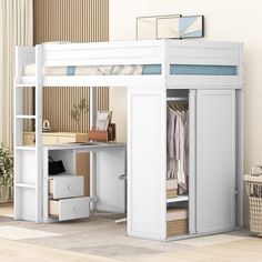 a white loft bed with a desk underneath it and drawers on the bottom shelf below