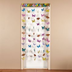 the window is decorated with colorful butterflies