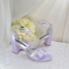 A beautiful handmade bridal shoe. Satin block heels with extra padded soles, these wedding shoes are perfect for '12 hour' wear. A range of colours available include a beautiful light blue...perfect for that 'Something Blue'.  Design Details: * Handmade  * Material: Satin  * Extra Padded Soles for Comfort  * Heel Height: 8cm * Colour Availability: Lilac, White, Ivory, Black, Navy, Blue, Sky Blue, Turquoise, Champagne, Green, Purple, Plum, Red, Silver, Yellow, Wine, Pink, Pale Pink  * Block Heel White Sandals Wedding, White Ivory Wedding, Pink Block Heels, Shoes For Bride, Strappy Block Heel Sandals, Bridal Shoe, Lilac White, Heel Protector, Purple Plum