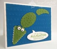 a card with an alligator and a fish on it