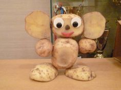 a stuffed animal sitting on top of a table