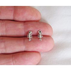 "Sterling Silver 11mm dainty Fishbone post stud earrings. Size is approximately 925 A B O U T We offer high quality jewelry for all. All items are nicely packaged. These Sterling Silver stud earrings are a dainty Fishbone design. They are approx. 11 x 5mm (7/16 x 3/16\"). The post is 11mm long. Weight is 0.6 grams. This item is stamped \"925\". Thank you for shopping with us ️ Feel free to send a message if you have any questions! * Metal Purity: 925 * Base Metal: Sterling silver * Metal: Sterli Silver Maple Leaf, Silver Theme, Tiny Charm, Sterling Silver Stud Earrings, Butterfly Shape, Leaf Charms, Fish Bone, Earrings Studs, Silver Stud Earrings