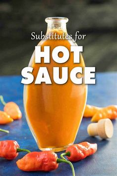 hot sauce in a glass bottle surrounded by peppers and garlic on a blue surface with the words, subtitues for hot sauce