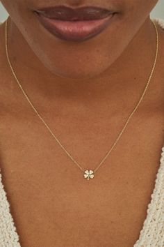 Jennifer Meyer diamond mini clover necklce in yellow gold. 14K, 18K Yellow Gold Diamonds Handcrafted in 18k yellow gold, this diamond mini four leaf clover necklace is punctuated with white diamonds. A playful design and symbol of good luck, wear this necklace to elevate your everyday layer. 16" L, Pendant measures approximately 0.4" x 0.3" Made in LA Clover Necklace Gold, Clover Locket, 4 Leaf Clover Necklace, Shamrock Necklace, Diamond Necklace Simple, Clover Jewelry, Jennifer Meyer Jewelry, Four Leaf Clover Necklace, Gold Outfit