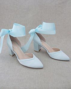 "Classic and elegant lace almond toe block heels with soft ribbon wrapped around ankles. Perfect for weddings, parties, or any special occasion. DETAILS: HEEL HEIGHT: 2.75 inches COLORS AVAILABLE: Ivory, White, Light Blue, Dusty Pink, Champagne, Burgundy, Navy and Black UPPER: Synthetic upper and lining MATERIALS: Manmade outsole STYLE NAME: SALLY SIZE FIT: RUNS LARGE Not sure of which size to purchase? Shoes measurements are as follow: (Please note measurements taken the length of inside of sho Bridesmaid Wedding Shoes With Satin Bow And Block Heel, Closed Toe Wedding Shoes With Bow For Bridesmaids, Bridesmaid Wedding Shoes With Wrapped Low Heel, Bridesmaid Wedding Shoes With Bow And Closed Toe, Closed Toe Wedding Shoes With Ribbon, Low Heel Bridesmaid Wedding Shoes With Satin Bow, Bridesmaid Low Heel Wedding Shoes With Satin Bow, Bridesmaid Wedding Shoes With Satin Bow, Low Heel Bridesmaid Heels With Wrapped Heel