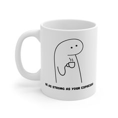 a white coffee mug with the words as strong as your expression