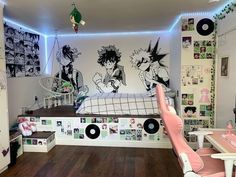 a bed room with a neatly made bed and various pictures on the wall