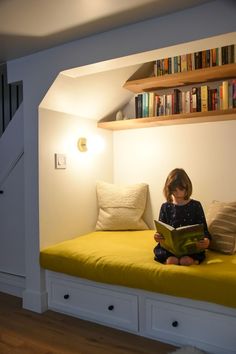 Sofa Nook, Reading Window, Bright Basement, Bed Under Stairs, Basement Transformation, Family Basement, Brick Tudor, Reading Nook Closet