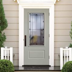 the front door is painted gray with white trim