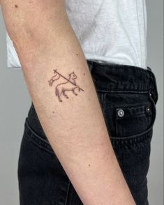 Arm tattoo of a lamb and a cross Angus Dei Tattoo, Aesthetic Biblical Tattoos, St Therese Tattoo, Grace And Mercy Tattoo, Minimalist Jesus Tattoo, Monstrance Tattoo, Eucharist Tattoo, Agnus Dei Tattoo, Biblical Art Tattoo