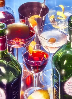 several different types of alcoholic drinks on a table