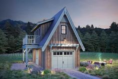 a small wooden house with a balcony on the roof