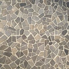 a close up view of a stone floor that looks like it is made out of rocks