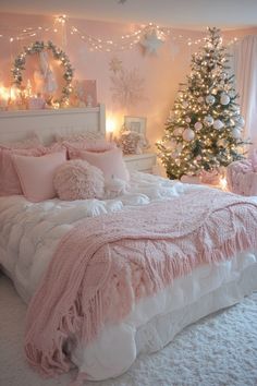 a bedroom decorated in pink and white with a christmas tree