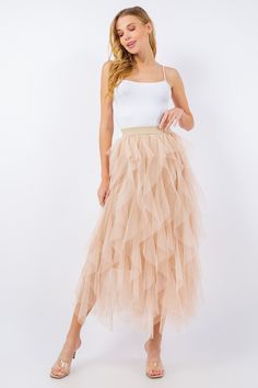 Ruffled asymmetric tulle skirt Inner lining  Elastic waist band Handwash cold Spring Asymmetrical Tulle Skirt, Chic Tulle Lined Maxi Skirt, Spring Elegant Layered Skirt, Elegant Layered Spring Skirt, Chic Layered Skirt For Spring, Spring Tulle Asymmetrical Skirt, Chic Party Skirt With Layered Hem, Chic Layered Hem Party Skirt, Chic Asymmetrical Tulle Skirt