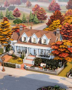 an artist's rendering of a house in the fall with trees and shrubs around it