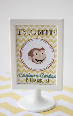 there is a photo frame with an image of a monkey on it and the words let's go bananas