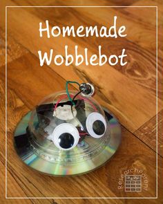 a cd with googly eyes on it and the words homemade wobblebot