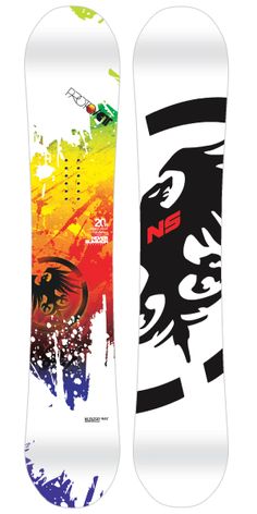 a snowboard with an eagle on the bottom and rainbow paint splattered on it