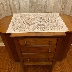 This Off White lace dresser scarf features an oval with a cluster of flowers in the center enclosed by a border. Excellent condition  Measures 18 inches wide x 12 inches long Dresser Scarf, Holiday Sales, Linen Tablecloth, Dining Linens, Tablecloths, Table Linens, White Lace, Table Cloth, Dresser