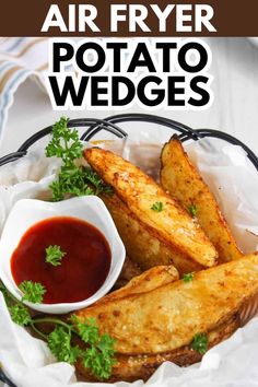 air fryer potato wedges in a basket with ketchup and parsley