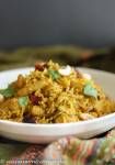 a white bowl filled with food on top of a table