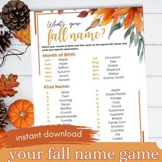 a fall baby shower game with pumpkins and pine cones on the table next to it