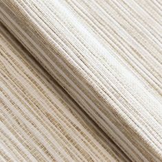 the textured fabric is white and beige, with small stripes on it's edges