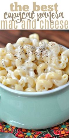 macaroni and cheese in a blue bowl on a colorful place mat with the title overlay