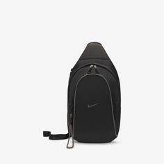 The Nike Sportswear Essentials Sling Bag is a comfortable carry-all with room for storing a reusable water bottle, packable jacket and more. Additional zippered pockets and an adjustable shoulder strap help you stay organized and ready for wherever the day takes you. This product is made with at least 50% recycled polyester fibers. Nike Crossbody Bag Outfit, Nike Sling Bag, Nike Crossbody Bag, Sling Bag Outfit, Crossbody Bag Outfit, Mochila Nike, Gloves Outfit, Sling Bag Black, Packable Jacket