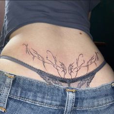 a woman's stomach with birds on it