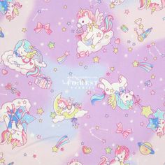 the fabric has unicorns and stars on it