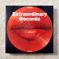 a red record sitting on top of a table