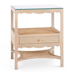 a wooden table with two drawers and glass top on the bottom, against a white background