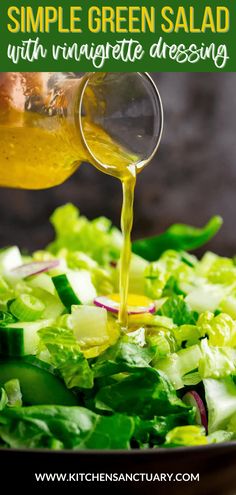 a salad with dressing being poured into it