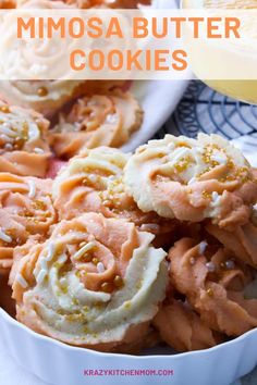 some cookies are in a white bowl on a table