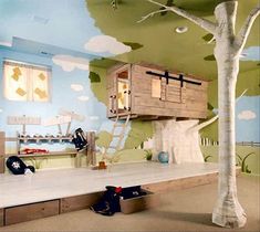 a room with a tree house painted on the wall